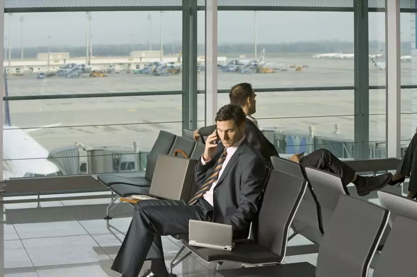 Businesspeople sitting in the airport.